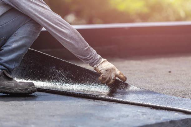 Professional Basement Waterproofing technician working in Dennison, OH